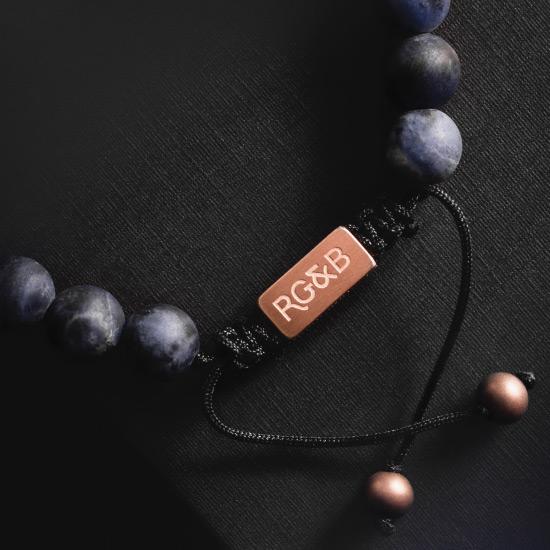 Sodalite Bracelet - Our Sodalite Bead Bracelet Features Natural Stones, Waxed Cord and Brushed Rose Gold Steel Hardware. A Beautiful Addition to any Collection.